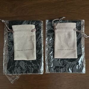LOT of two David Yurman jewelry cloth and jewelry satchel.